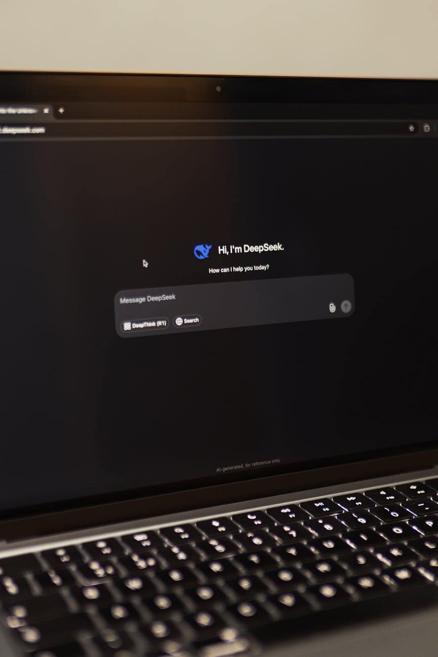 Home Image of a laptop showing an interactive AI interface with DeepSeek application.